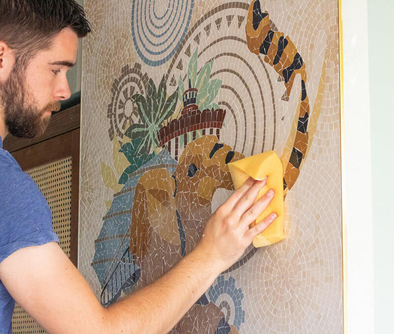 Laying the elephant mural mosaic