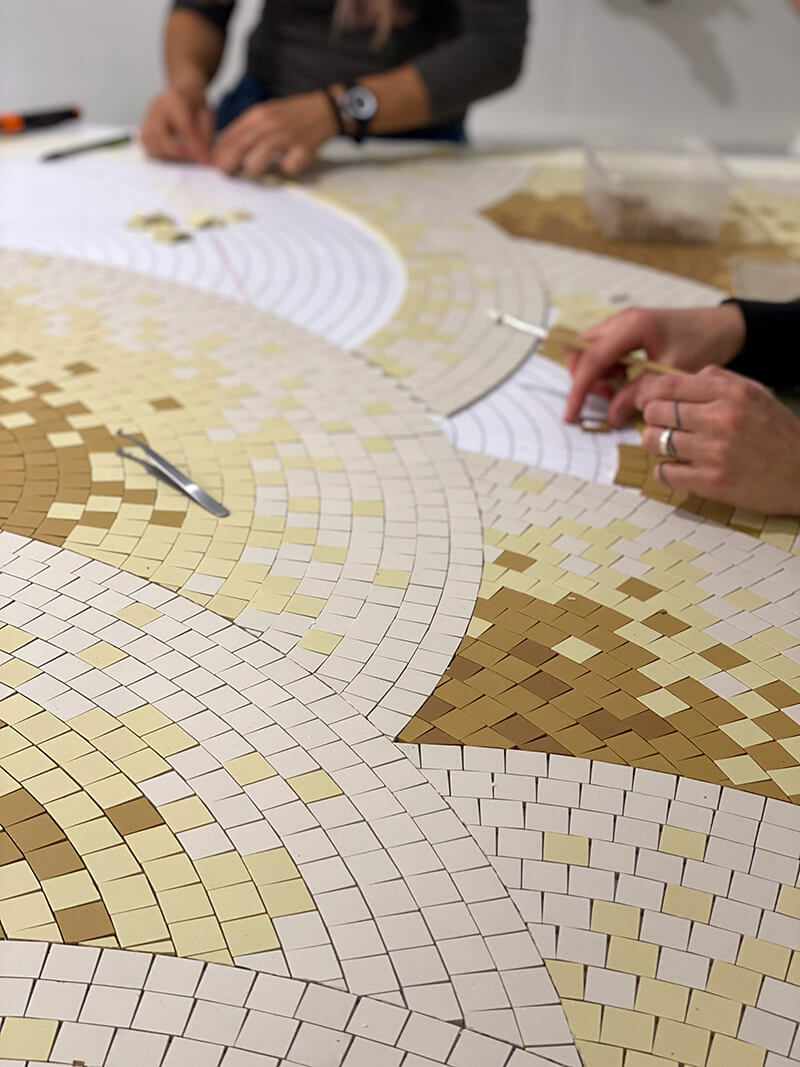 mosaic in progress at the workshop